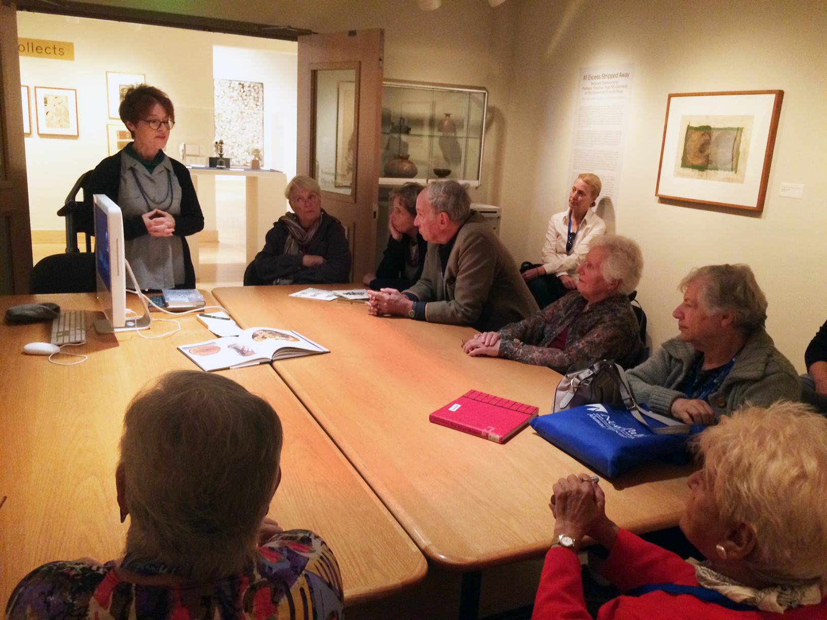 Prof. Elizabeth Brotherton speaks to a group of alumni who studied art history with Prof. Hugo Munsterberg in the 60s and 70s.